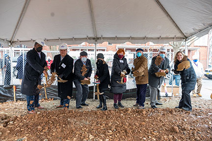 Woodlawn Trustees Inc. President & CEO Richard Przywara (2nd from left) and the Woodlawn Trustees board break ground on Phase 4 of The Flats.